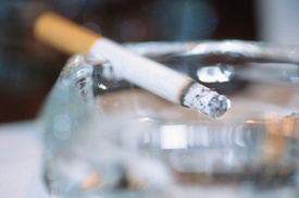 Study: Public Smoking Bans Help Smokers Light Up Less at Home