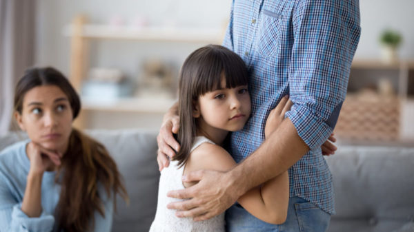 bigstock Unhappy Little Child Hug Leavi 304422565 scaled e1613439193720