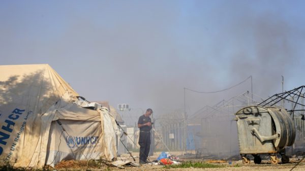 Cyprus police fire tear gas after migrant camp clashes