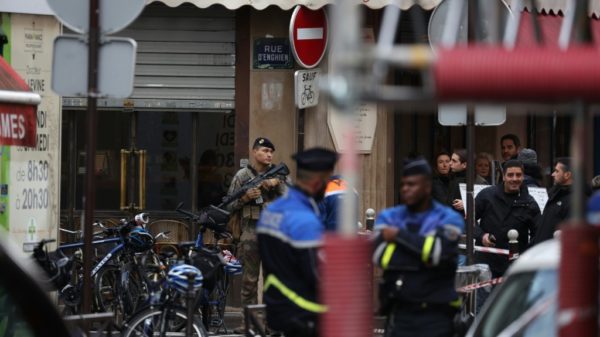 Paris shooting kills two wounds four prosecutor