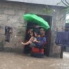 Philippines floods force tens of thousands to flee homes