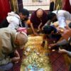 Myanmar pilgrims return to Buddhas golden footprints Health and