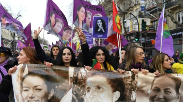Thousands march in Paris in memory of 2013 murder of
