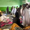 Stench of death engulfs Sudan hospitals but leaving is mortal